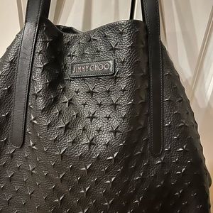 Authentic Jimmy Choo tote blk leather.  Beautiful condition used slightly.